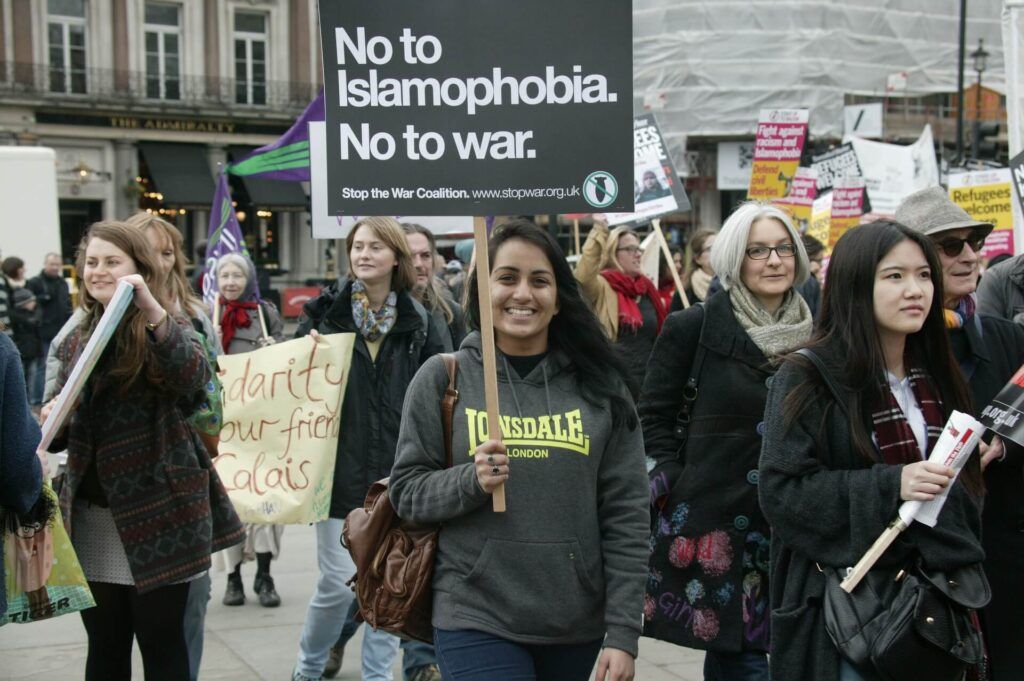 Protester holding sign