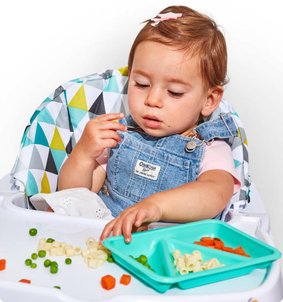 kid eating little spoon biteables