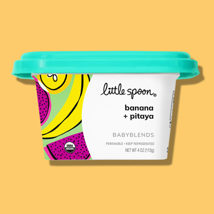 Colorful container of pureed baby food with a playful label, representing certified organic, heavy metal-tested purees for babies 6 months and older.