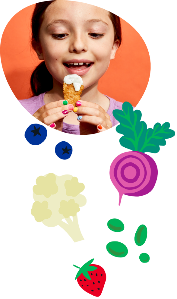 photo of girl eating Little Spoon products with some vegetables