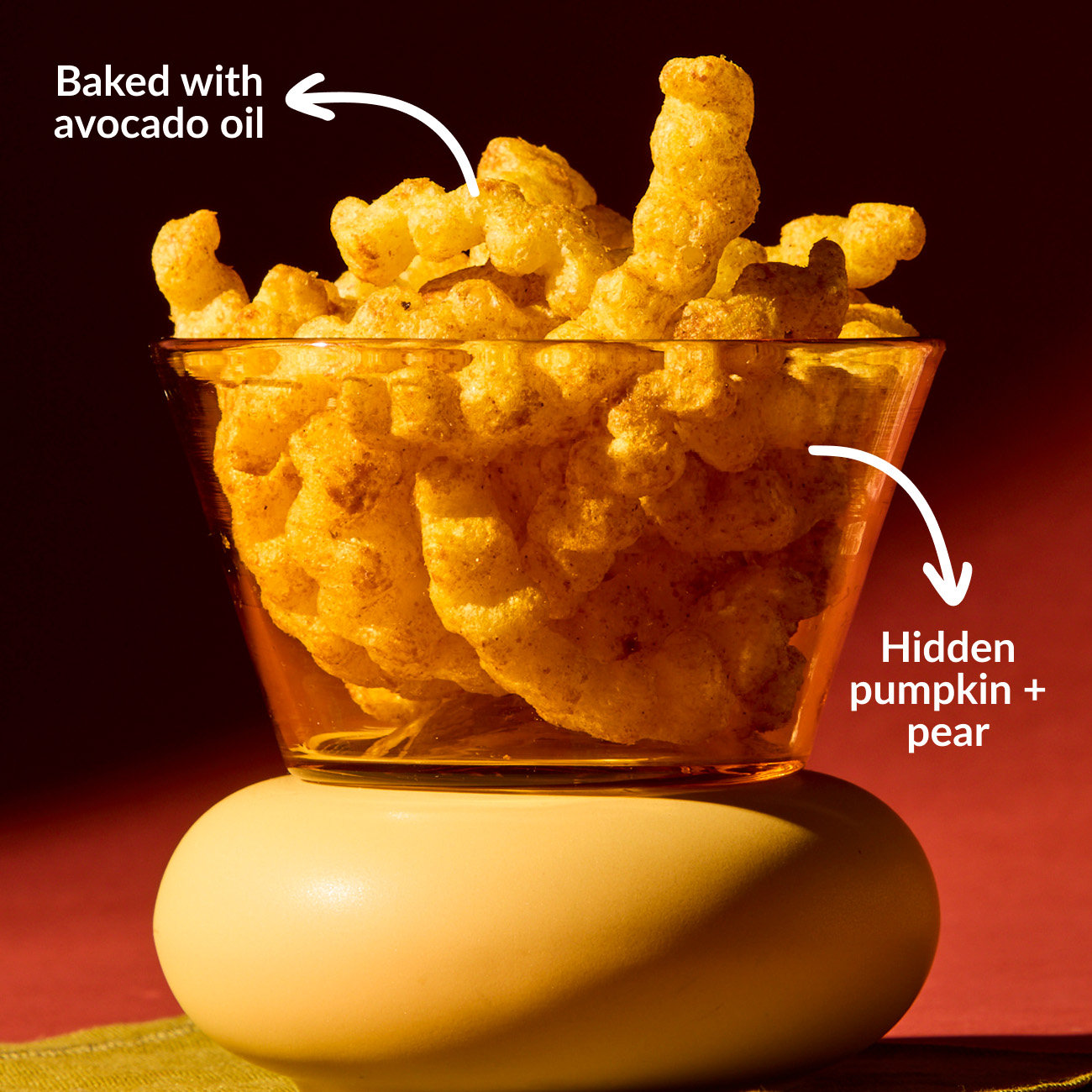 Limited Edition Pumpkin Pear Meltable Baby Crinkles in a clear bowl baked with avocado oil with hidden pumpkin and pear