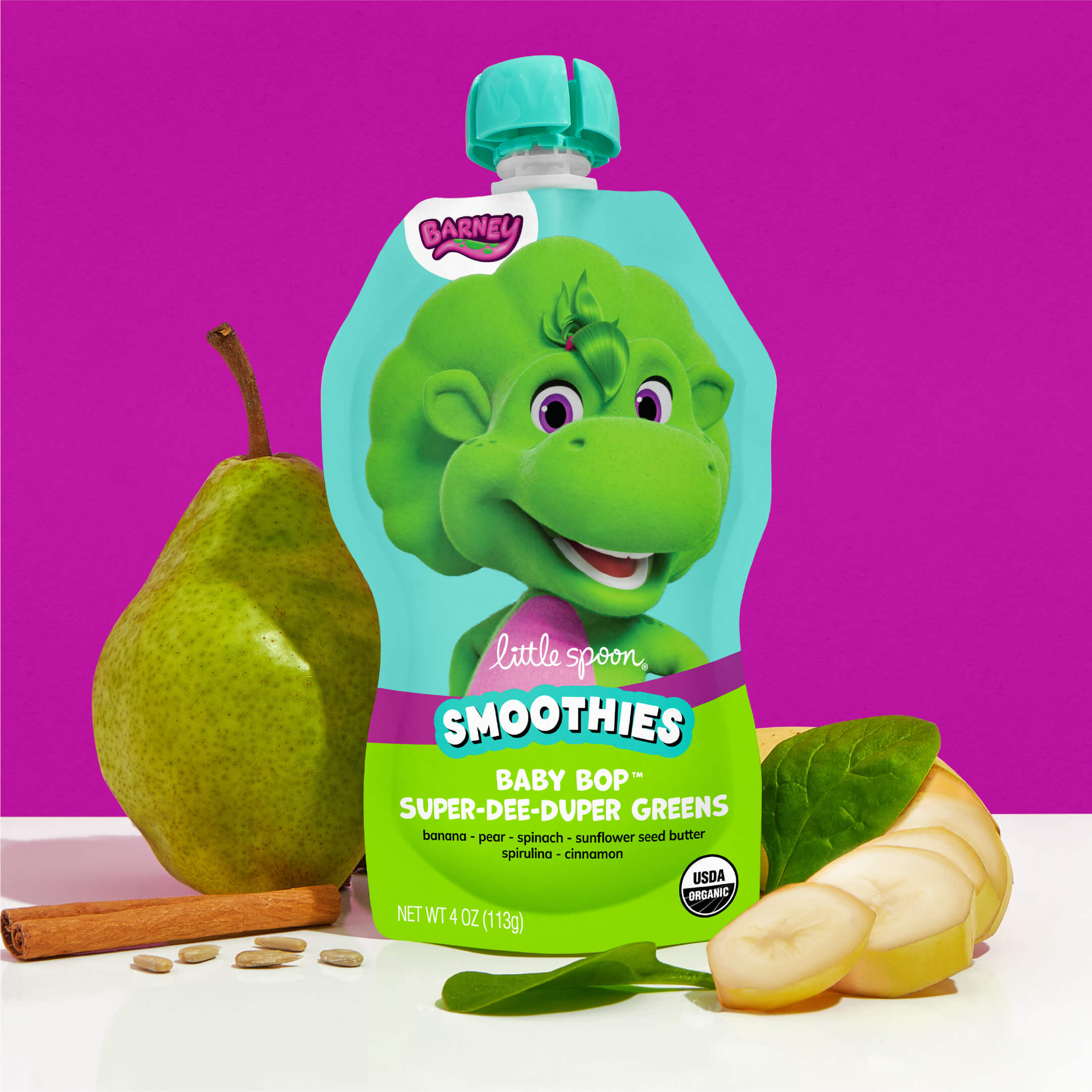 Baby Bop Super-Dee-Duper Greens smoothies with ingredients next to it- pear, cinnamon, banana, spinach and sunflower seeds