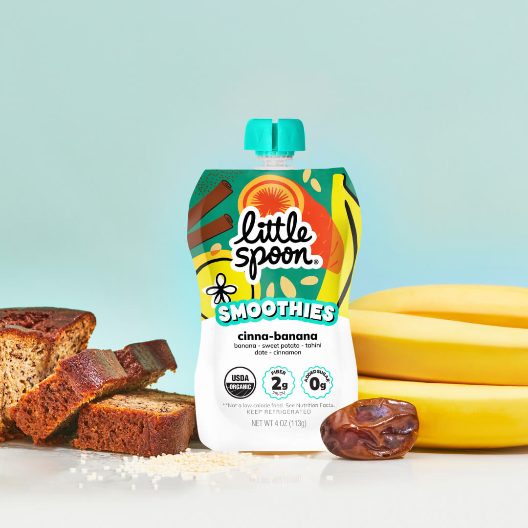 Organic Cinna-Banana with Creamy Tahini Smoothie Pouch next to banana bread