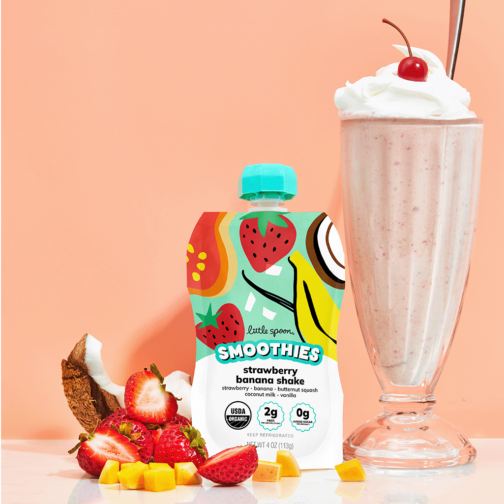 Strawberry Banana Smoothie pouch next to a strawberry banana smoothie with whipped cream