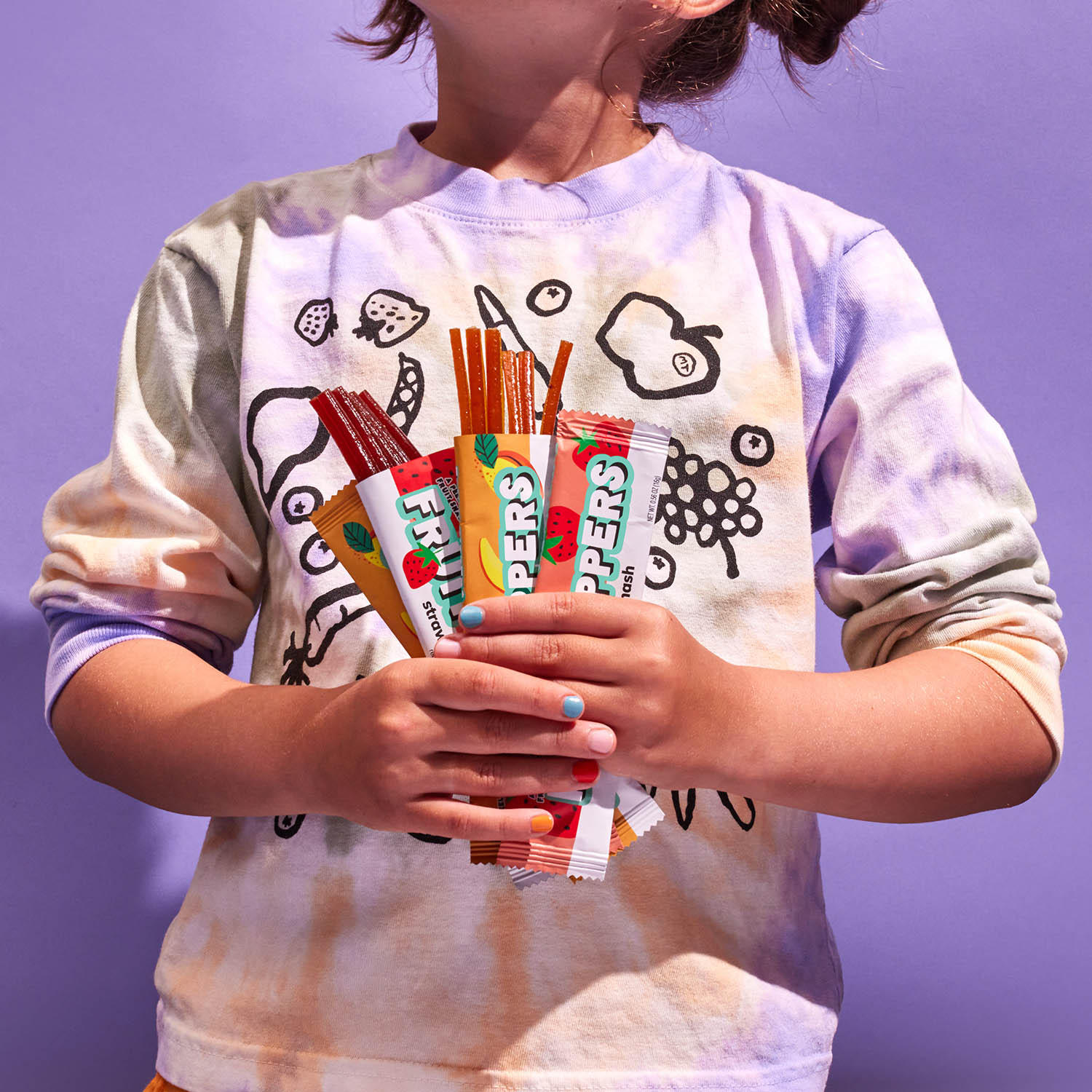 Girl holding Strawberry Smash Fruit Rippers