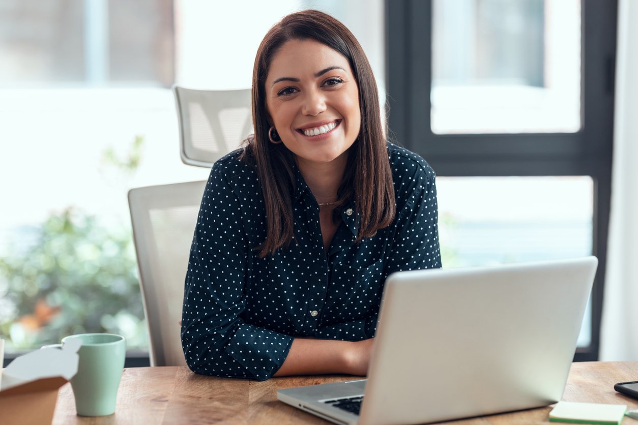 Stylish woman working at her desk