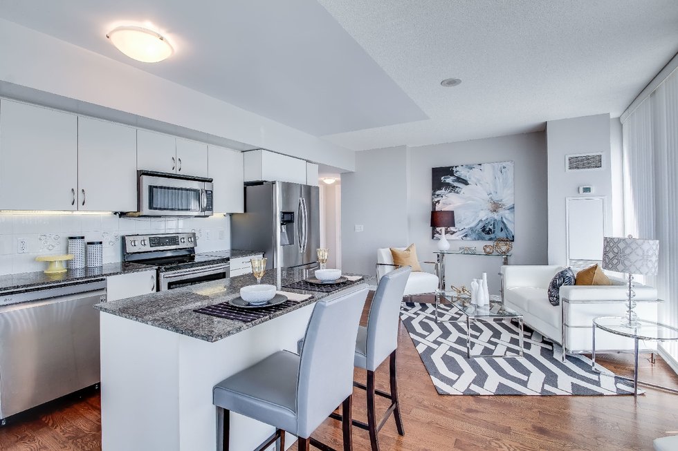 Modern rental property kitchen and living room