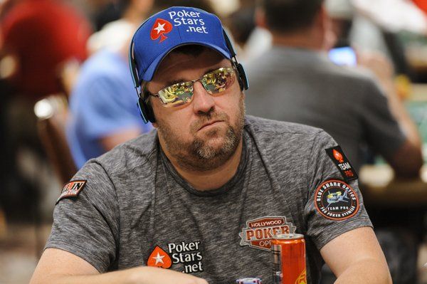 Chris Moneymaker wearing sunglasses and headphones