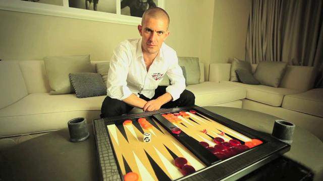 Gus playing Backgammon