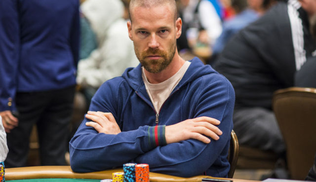 Patrik Antonius folding his arms at the poker table