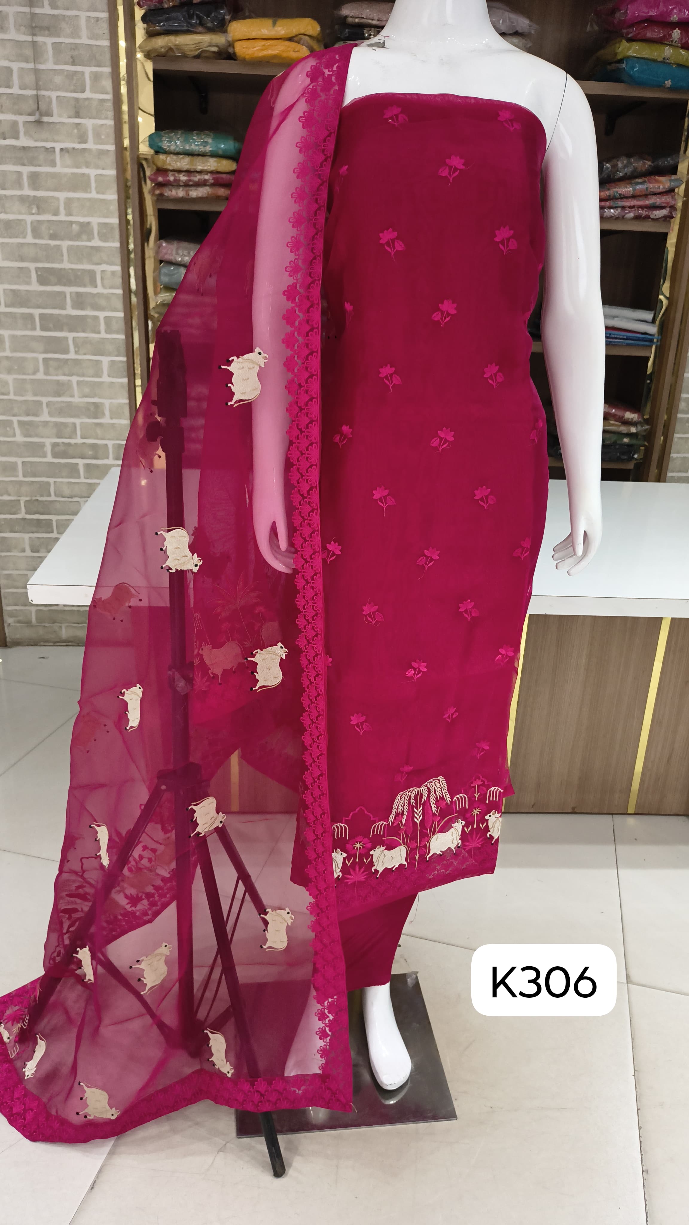 Organza silk party wear suits by Bella fashion