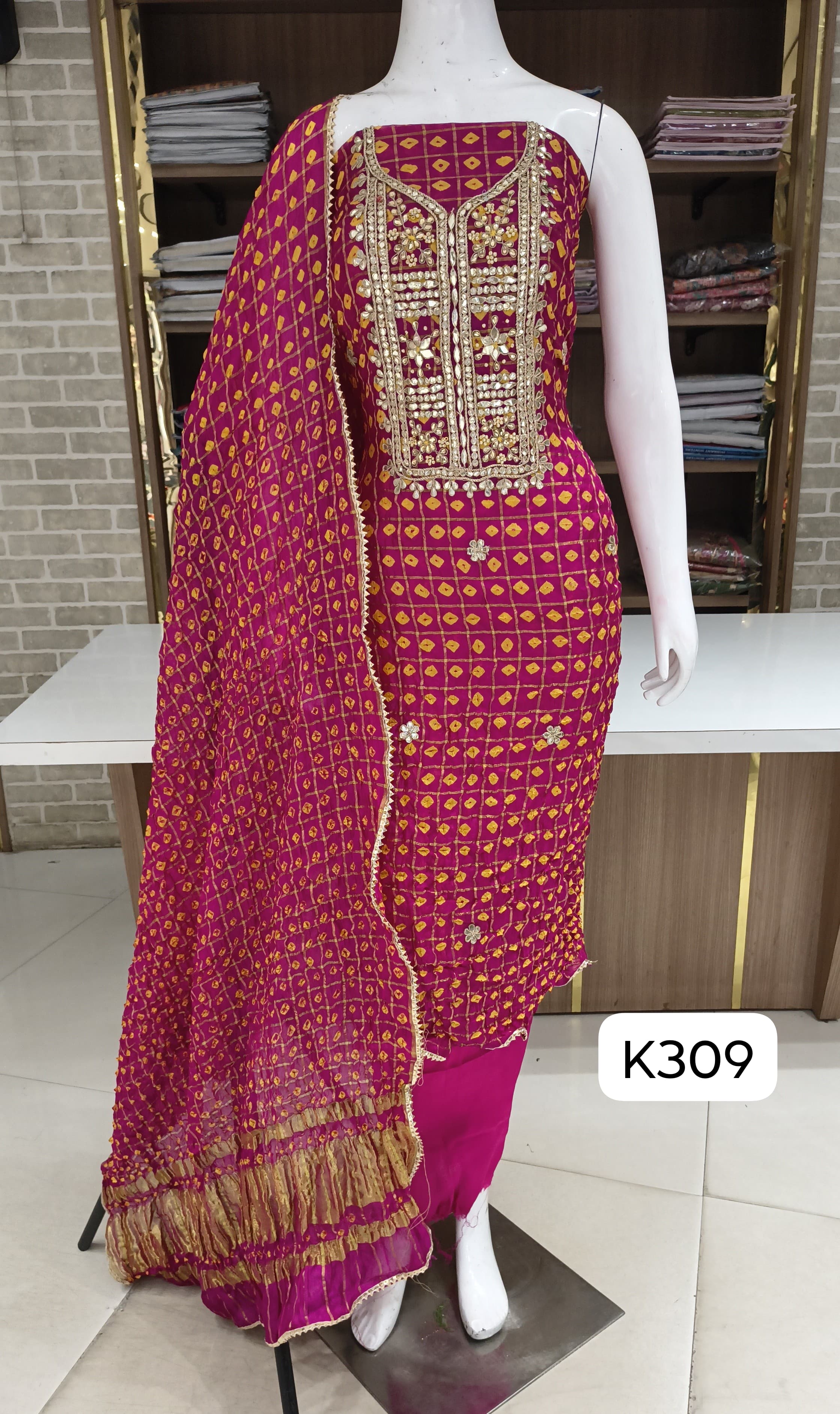 Bandhani special suits by Bella fashion