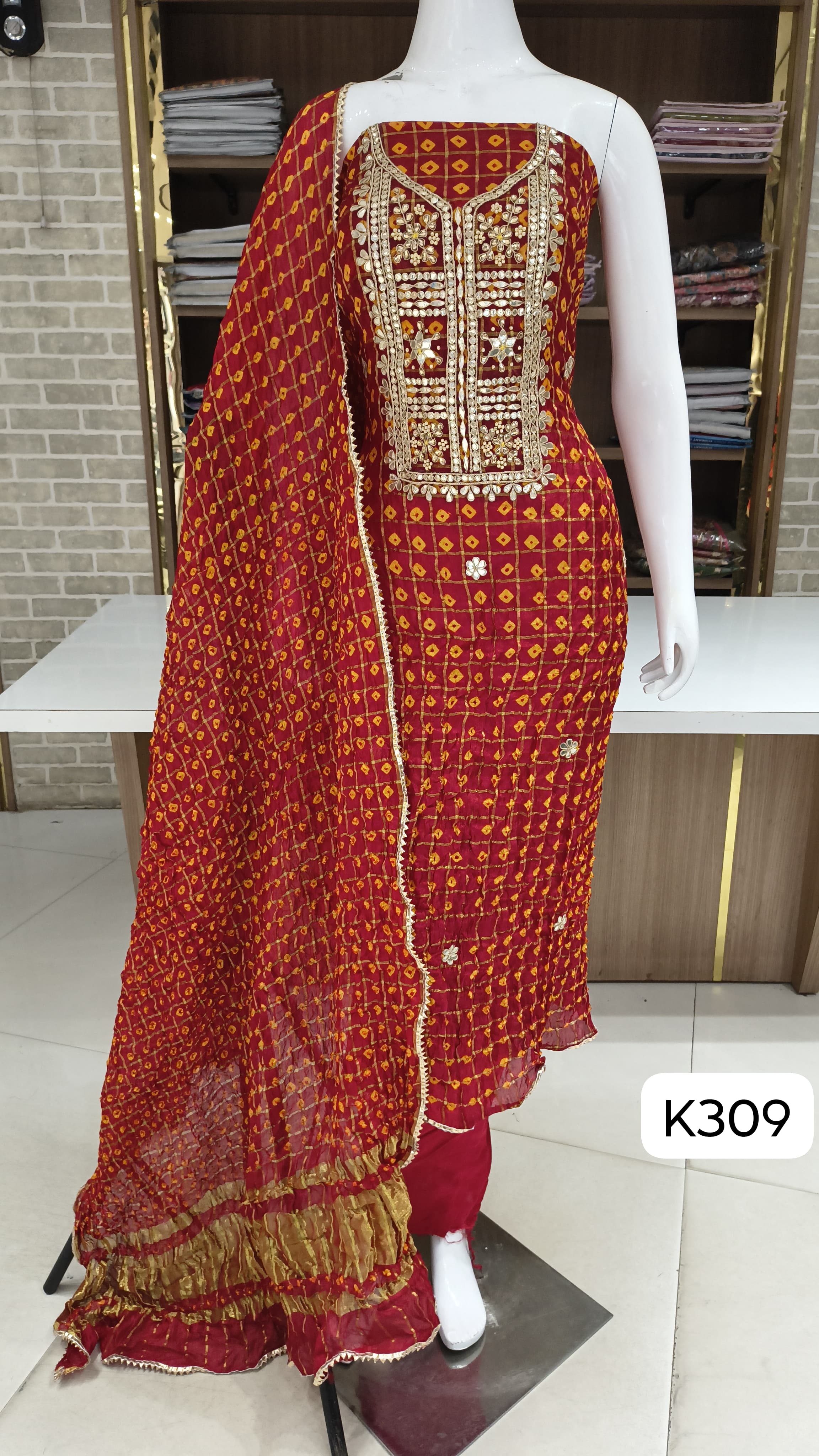 Bandhani special suits by Bella fashion