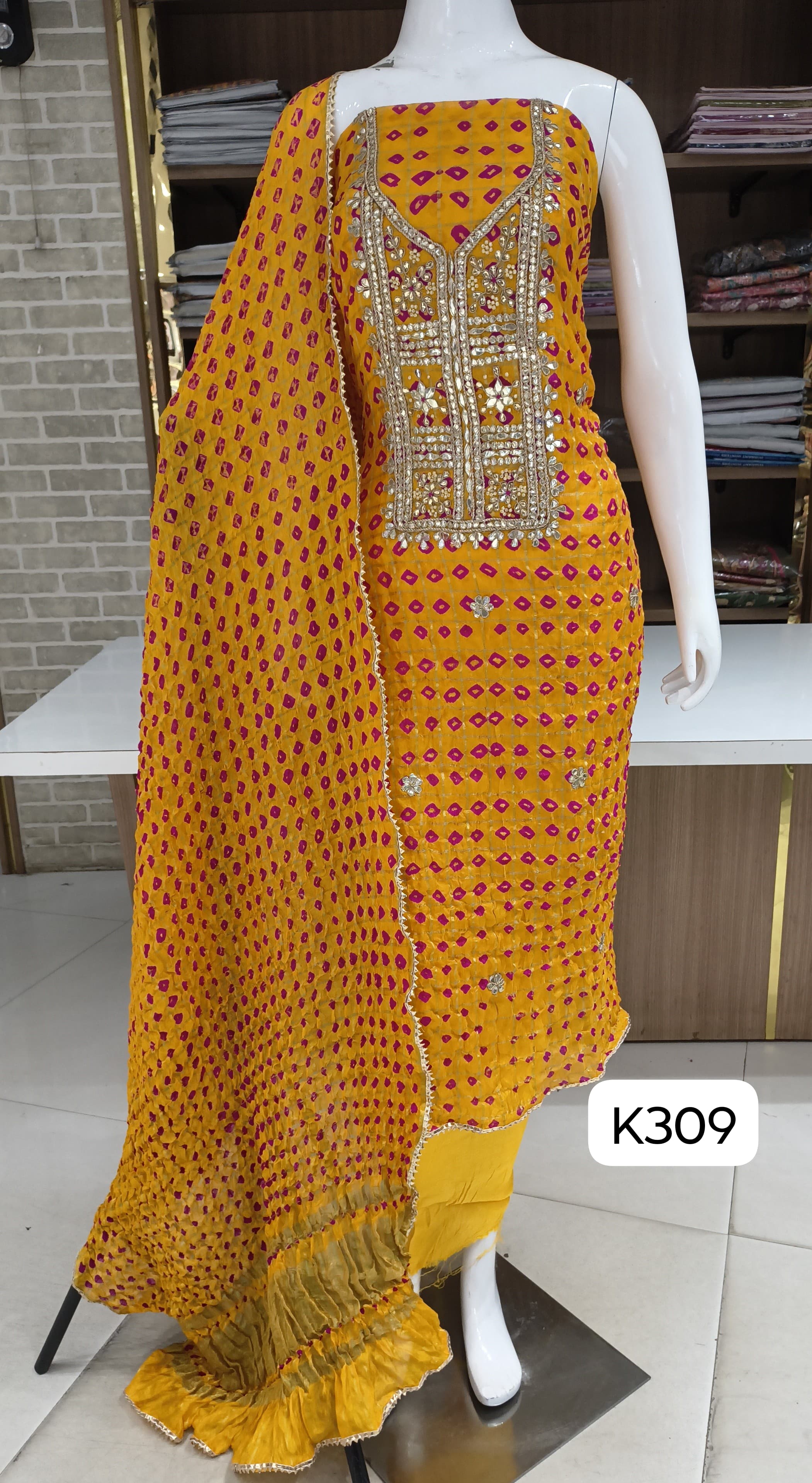 Bandhani special suits by Bella fashion