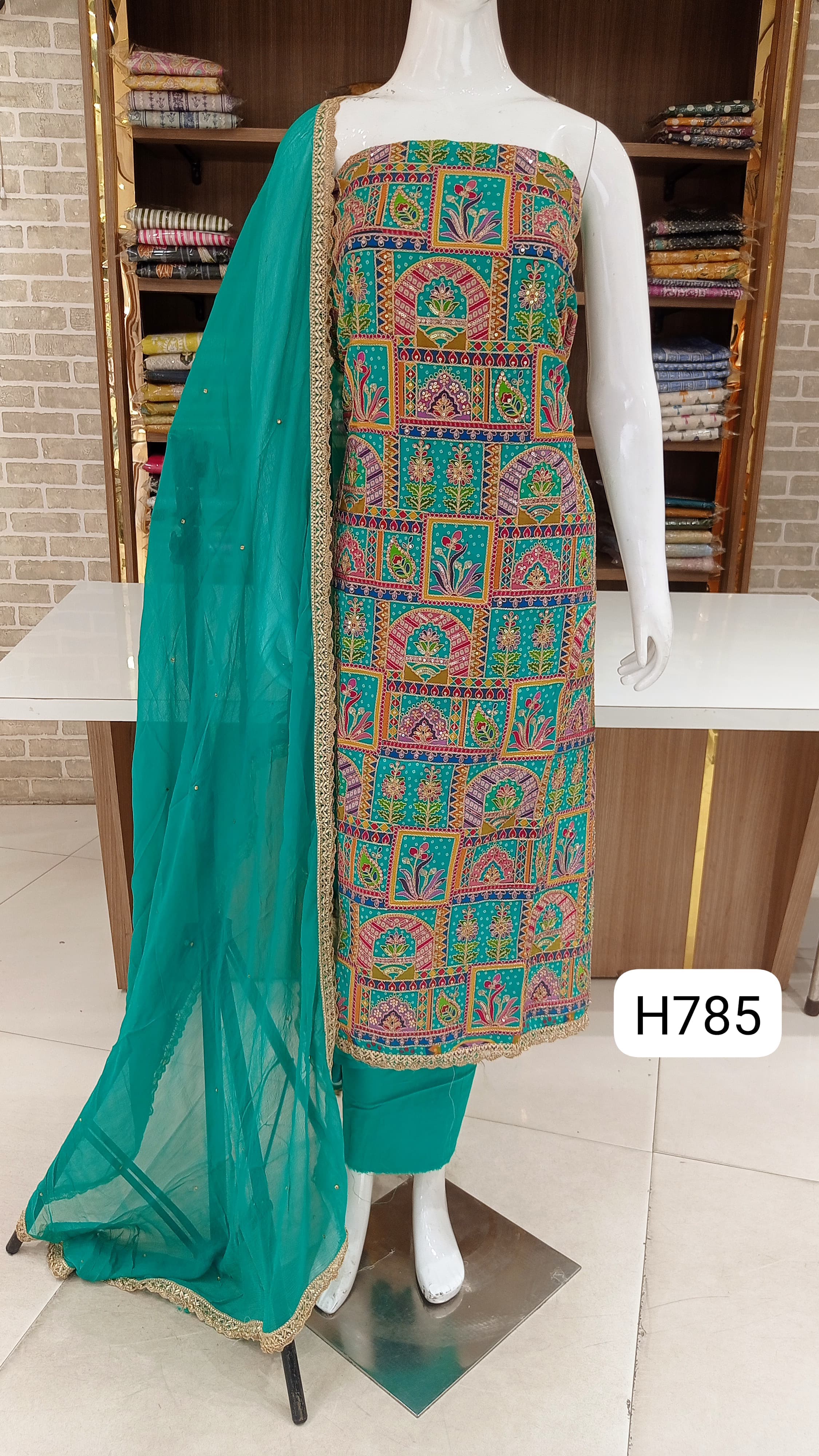 Imported pure soft silk with beautiful  self work full fronr super stylish suits