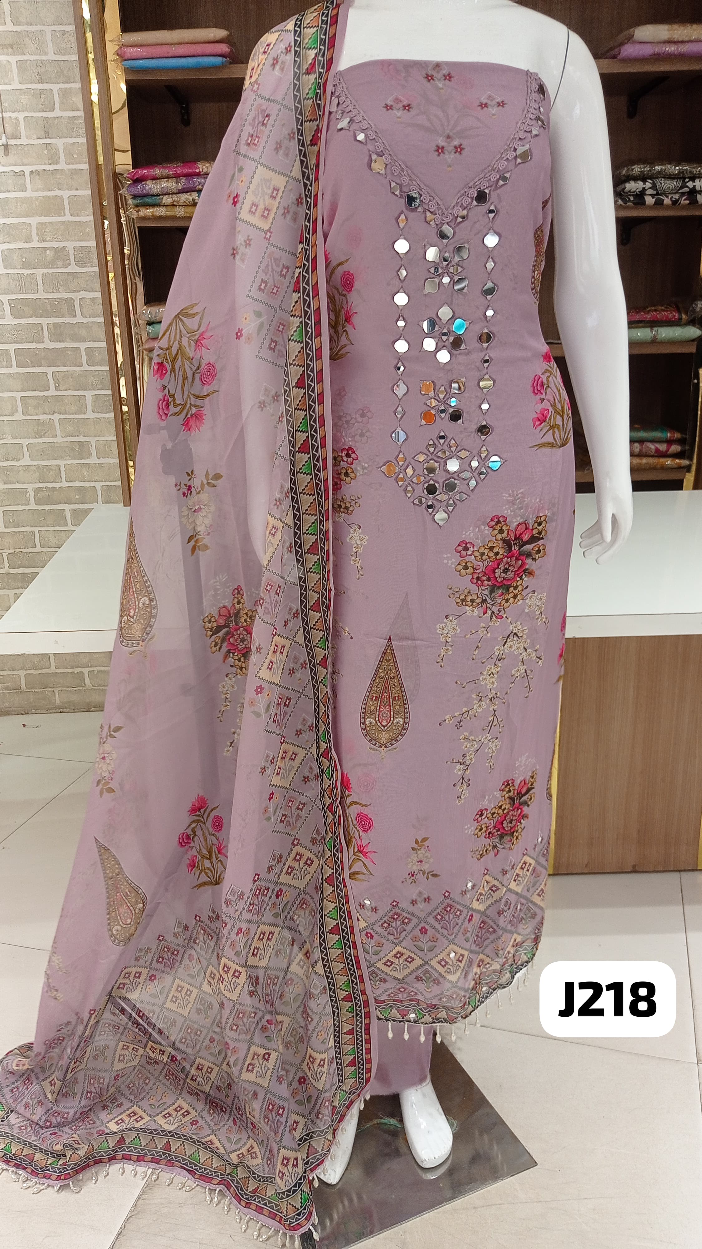 Imported Pure  organza  silk  beautiful print  with original mirror work 