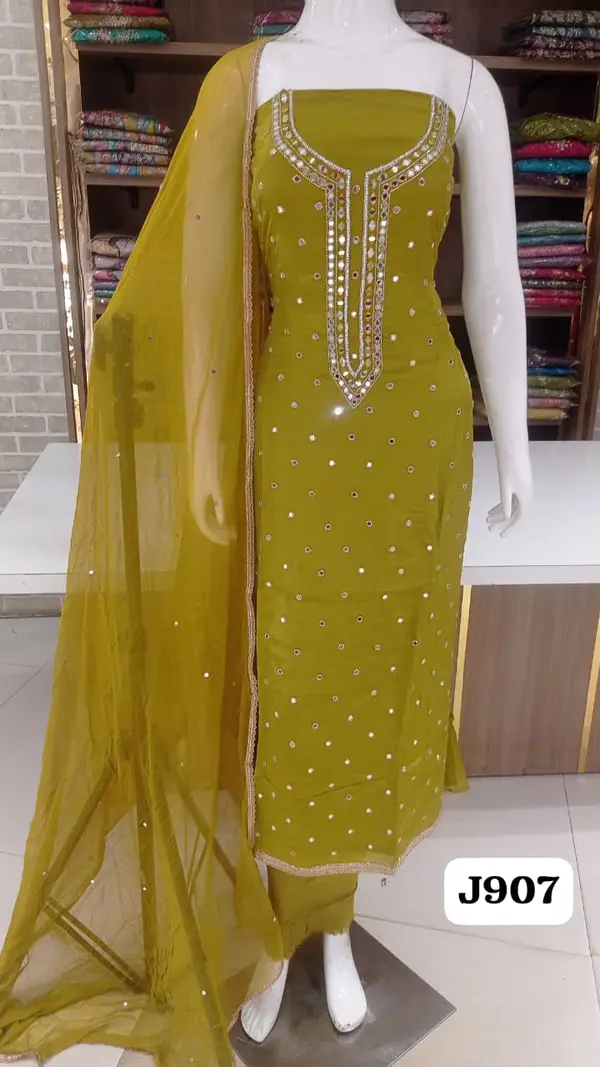 Soft silk party wear collection  with beautiful  full front original mirror work