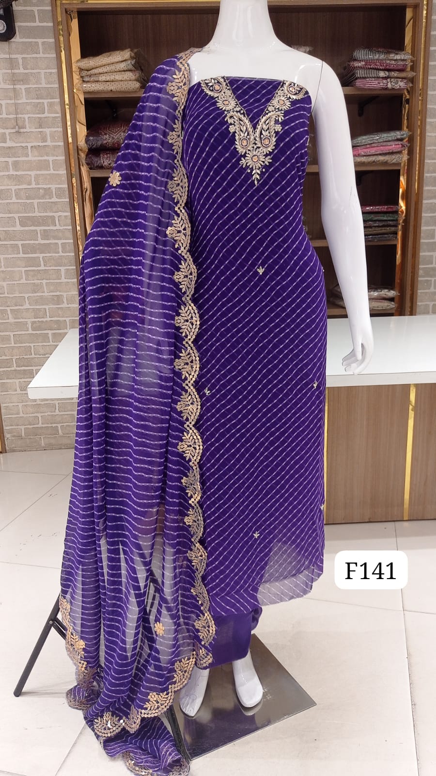 Georgette lehriyan print  party wear neck work suits .