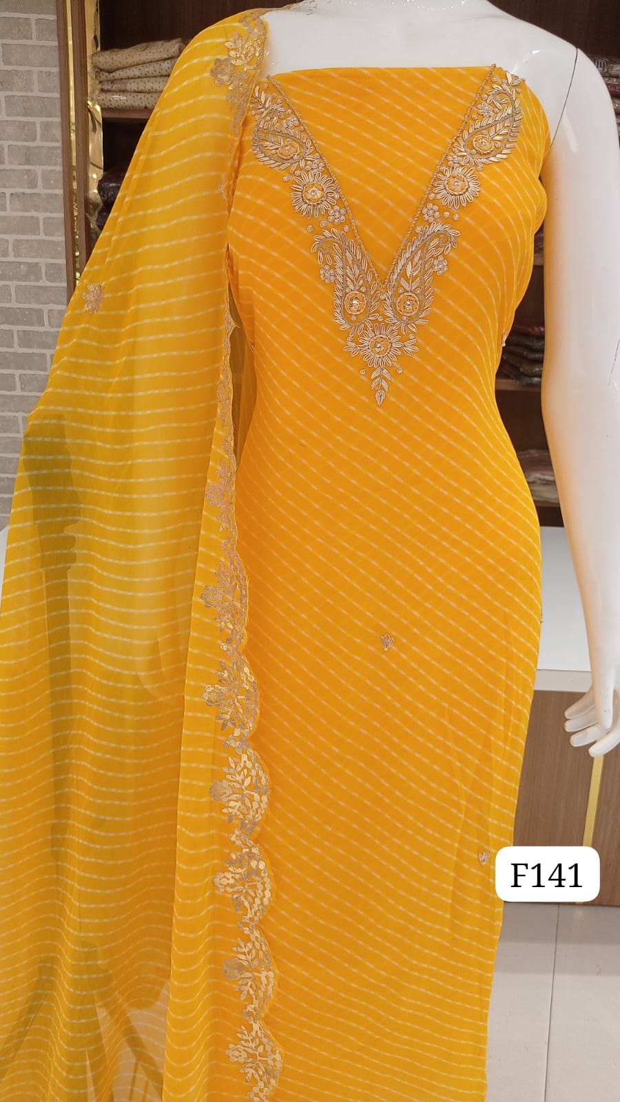 Georgette lehriyan print  party wear neck work suits .