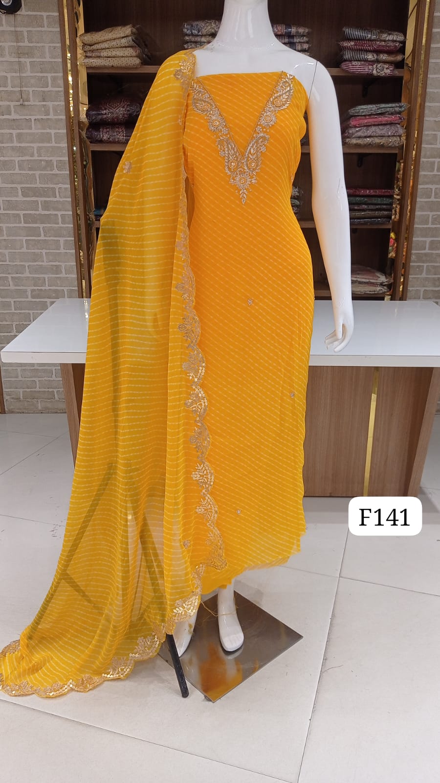 Georgette lehriyan print  party wear neck work suits .