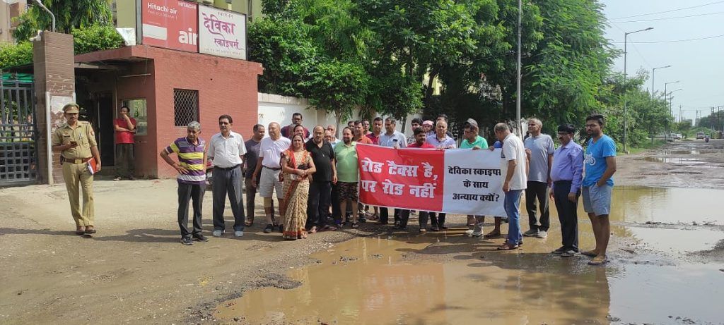 Rajnagar Extension Residents Rise Against Road Nightmare: Devika Skypers & VVIP Society Protests Deteriorating Conditions 3 112 19