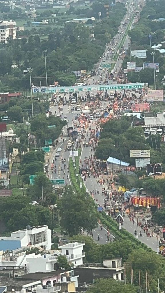 Divine Blessings from the Skies: Helicopter Showers Flowers on Kanwar Yatra Pilgrims in Meerut 2 112