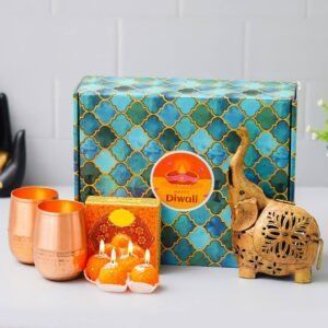 1 Metal Elephant Home Decor (5”*9”) – 2 Copper Glass – 4 Ladoo Candles