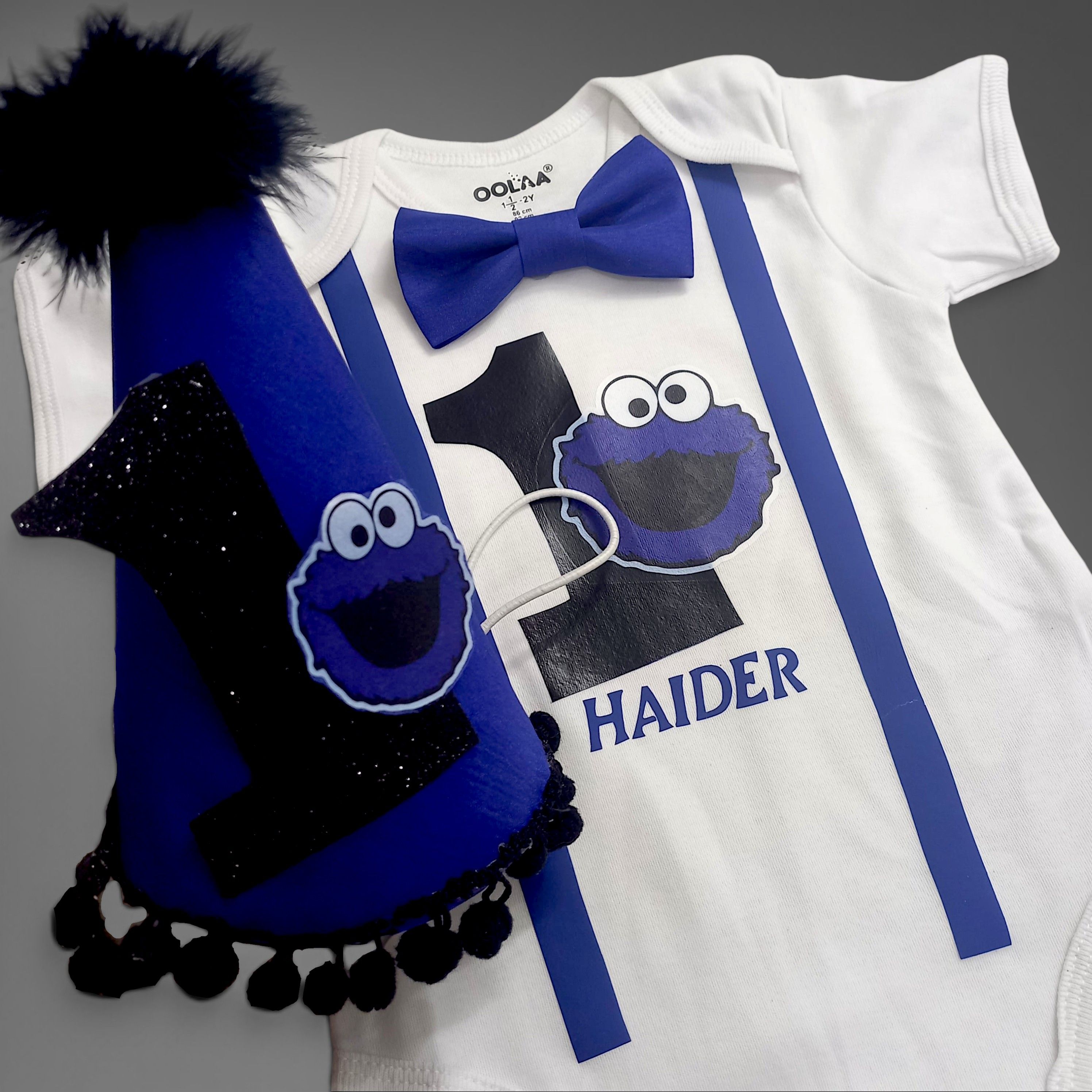 Cookie Monster Romper – handmade baby outfit, soft cotton romper with a front bow, made to order in Pakistan