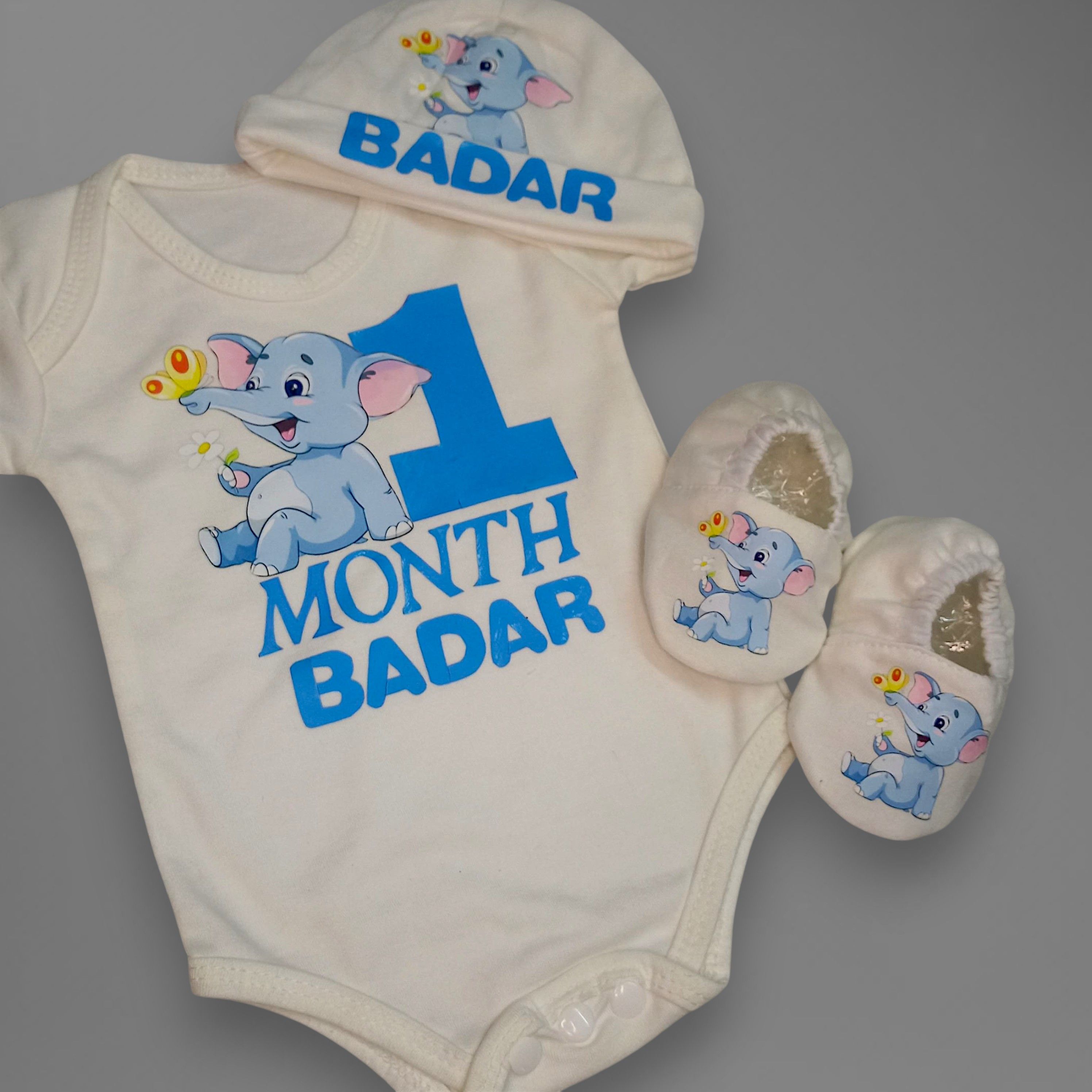 Elephant Romper Set – handmade baby outfit, soft cotton across the romper, cap, and booties, made to order in Pakistan