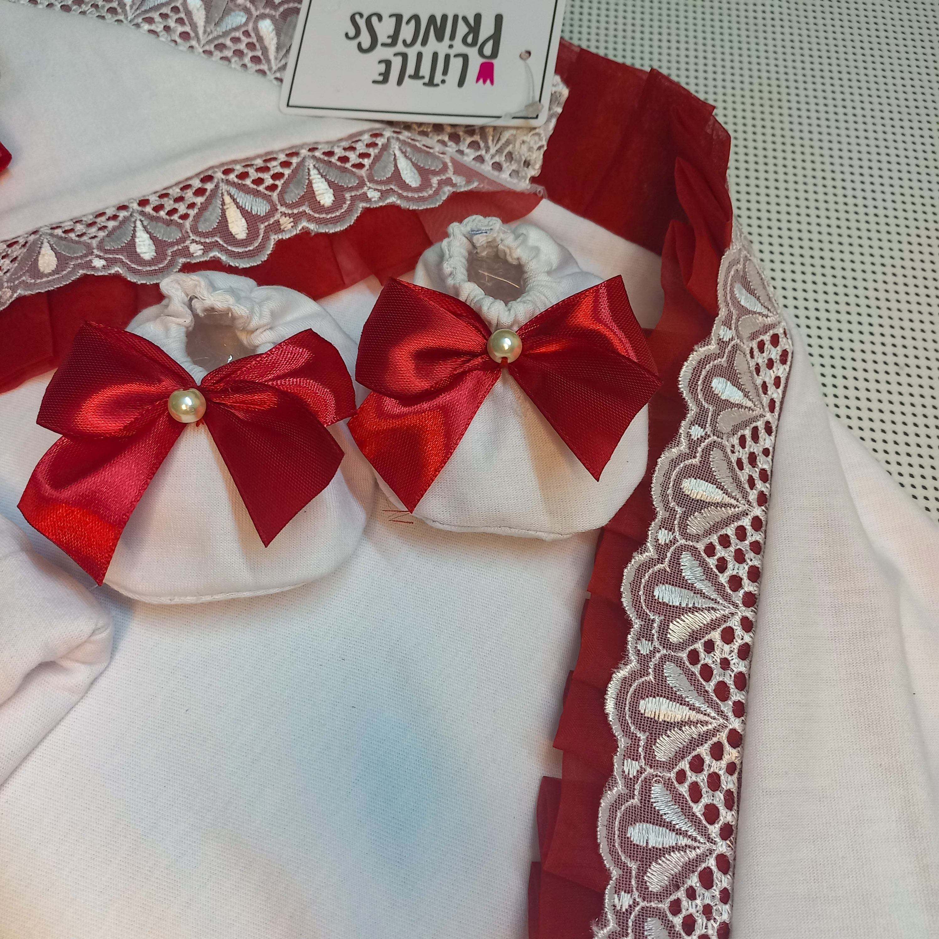 Baby Set with Pillow – handmade baby outfit, soft cotton with red trim across all pieces, made to order in Pakistan