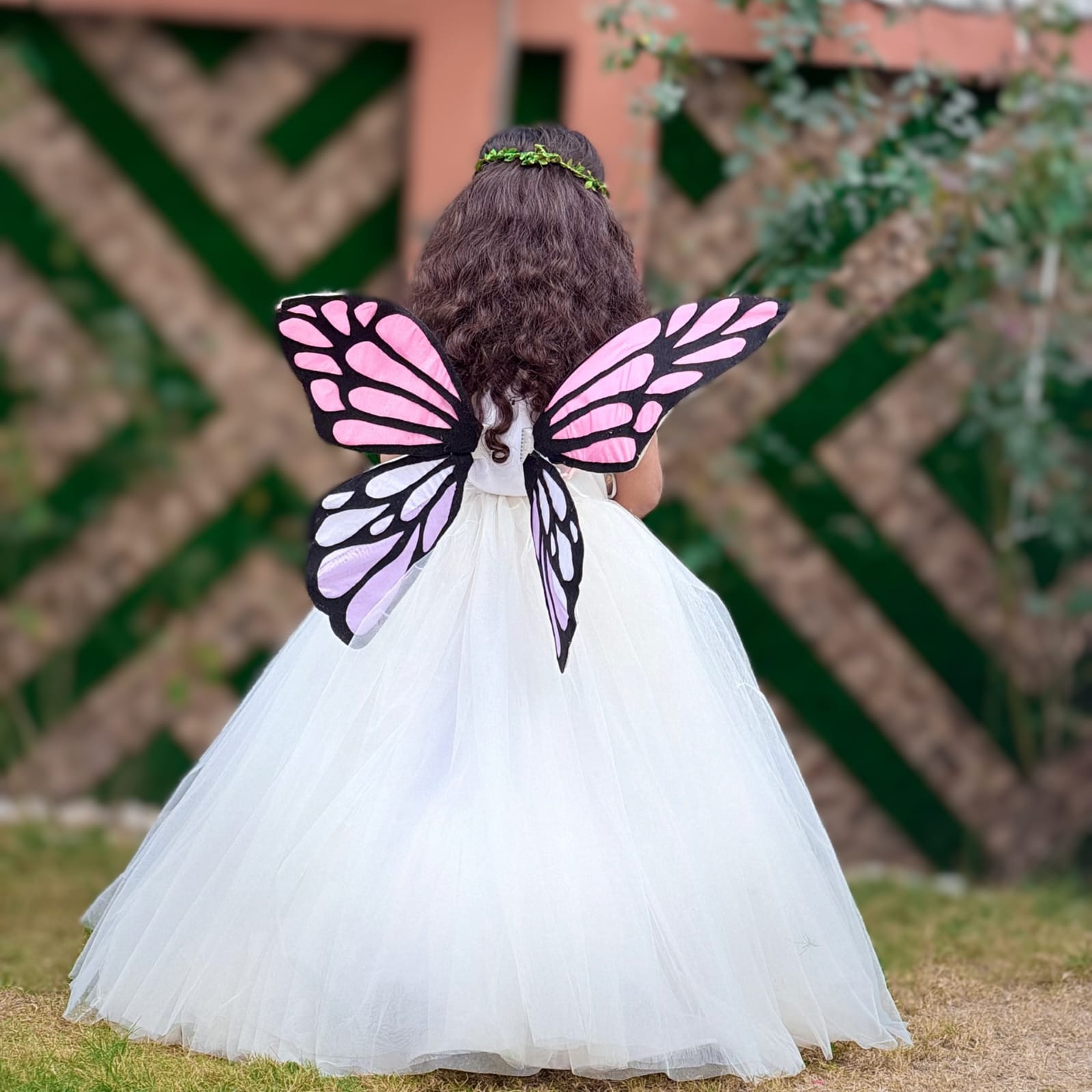 White Fluttering Butterfly Gown – handmade girls outfit, layered net with 3D pastel floral work on upper body, made to order in Pakistan