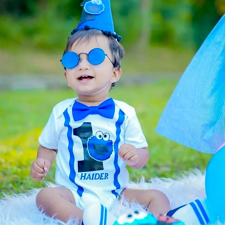 Cookie Monster Romper – handmade baby outfit, soft cotton romper with a front bow, made to order in Pakistan