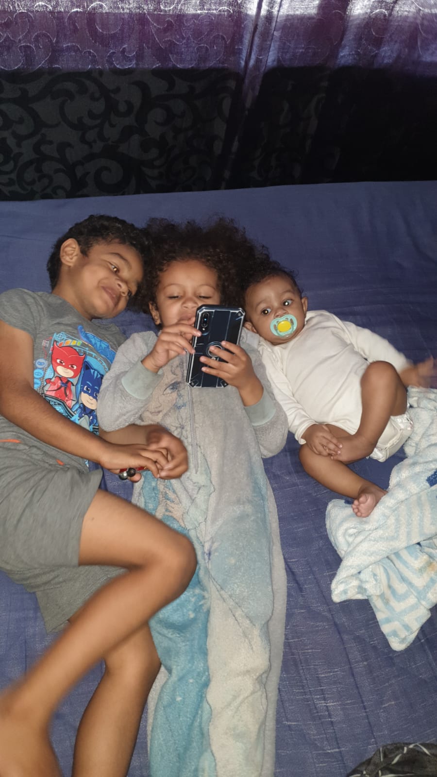 Father playing with his kids