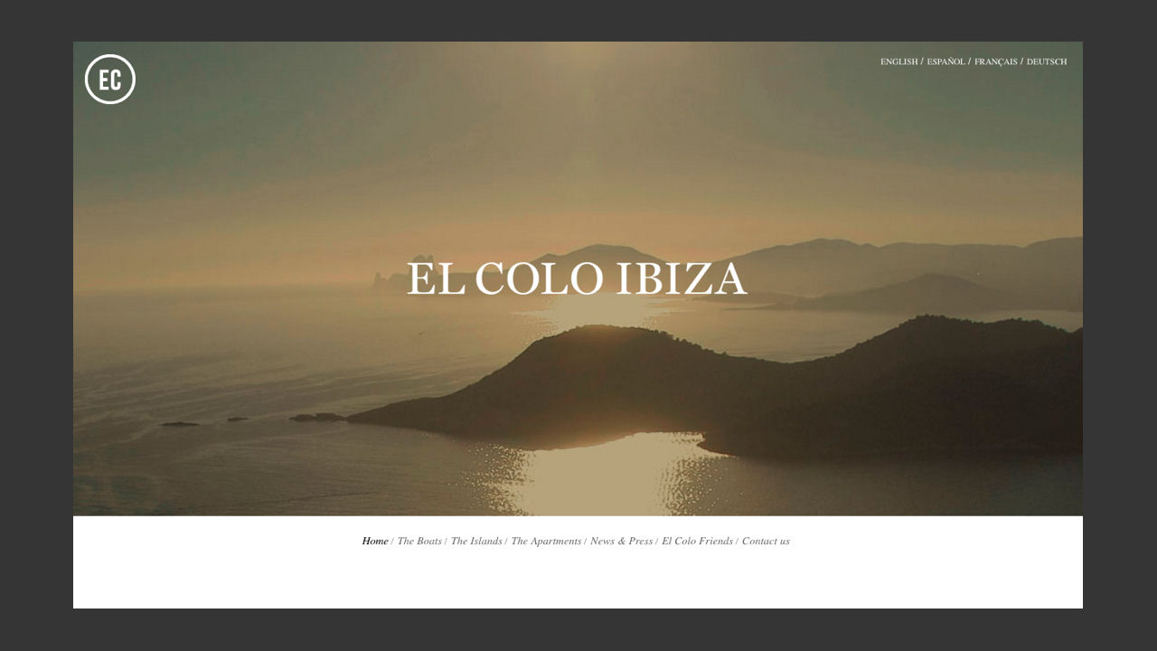 screenshot of the homepage of a luxury services website with a duotone photograph of Ibiza