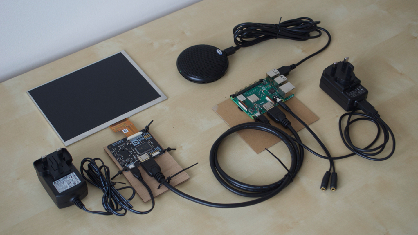 electronics and cables for a computer arranged on a table