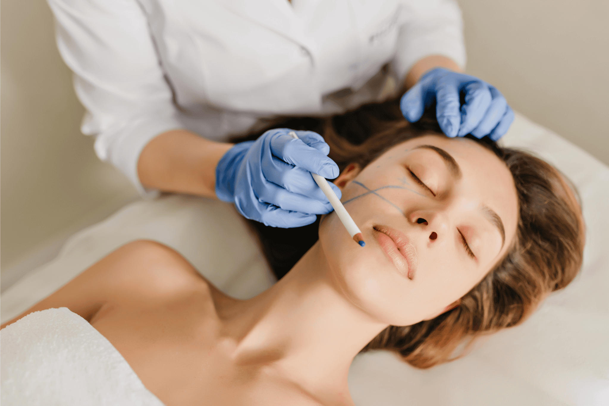 Client being prepared for cosmetic procedure
