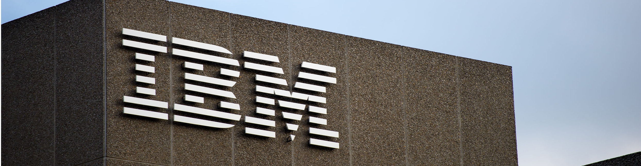 IBM logo on a building. IBM acquires Kubecost