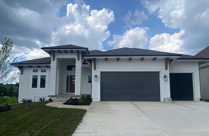 James Engle Custom Homes — 13476 W 149th St