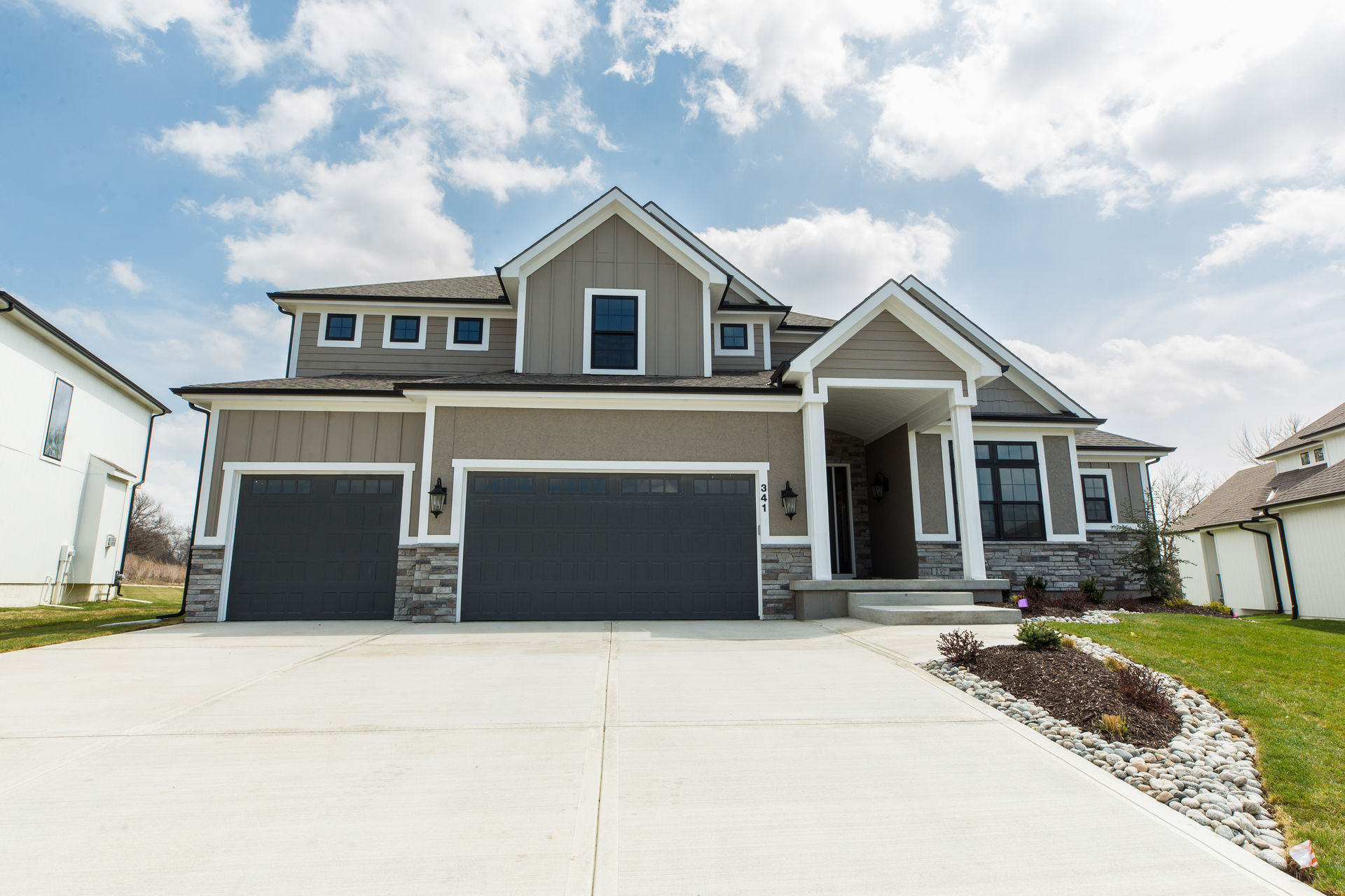 KC CUSTOM HOMES — 341 NW Ambersham Dr