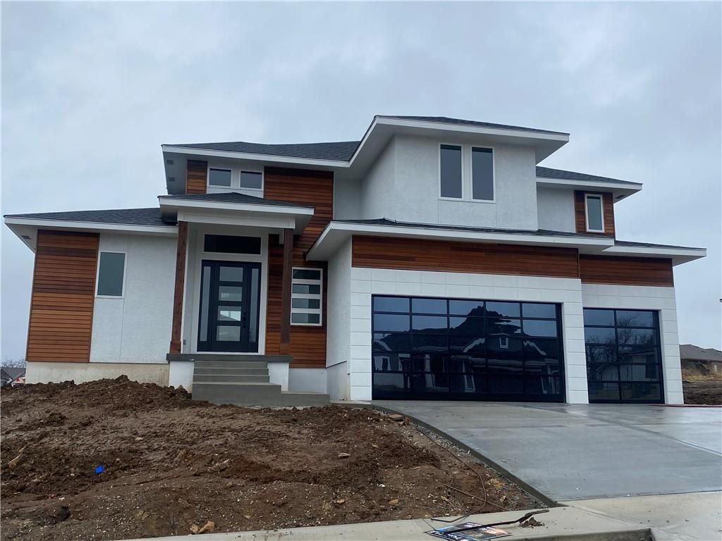 Spiess Custom Homes — 22625 W 87th Ter