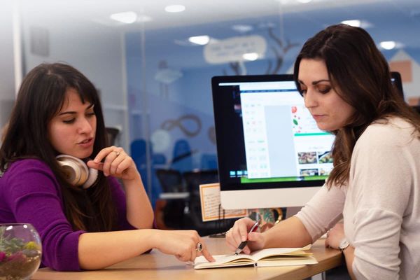 Sarah and Emily collaborating on a design