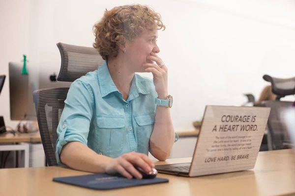 Erin Walter working at her desk