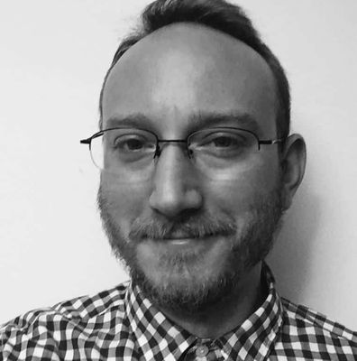 Black And White Headshot Of Man