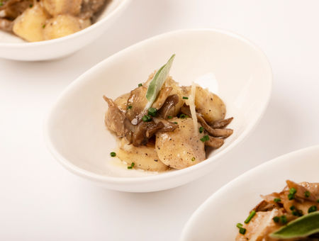 Truffle potato gnocchi plated for a Relish catered event
