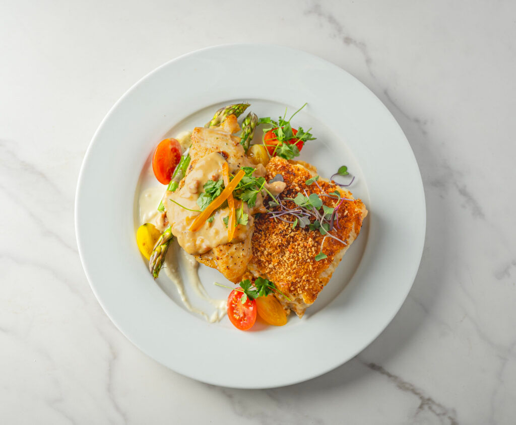 Chicken Prosecco Sauteed chicken breast with sun-dried tomatoes and basil-prosecco sauce