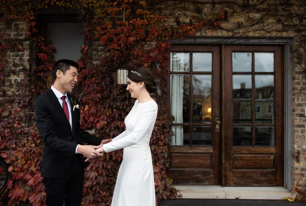bride groom holding hands