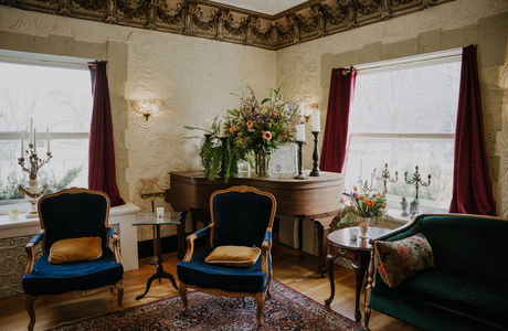 Vintage room setting with two blue chairs