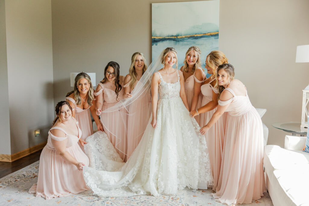 bride getting ready with bridesmaids