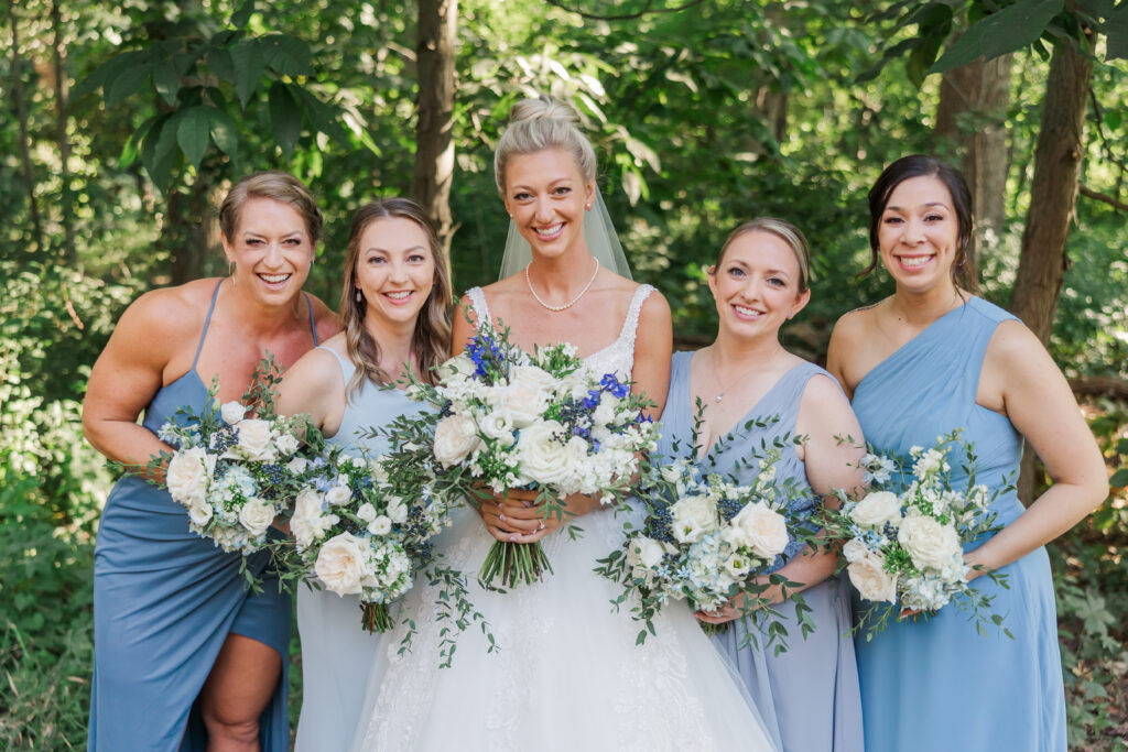 bride with bridesmaids and bouquets