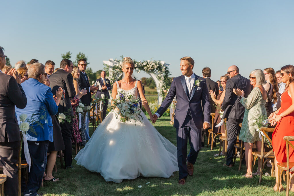 wedding couple walking down the aisle